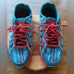 Montrail Sneakers Teal With Orange size 9 women’s Excellent used condition.